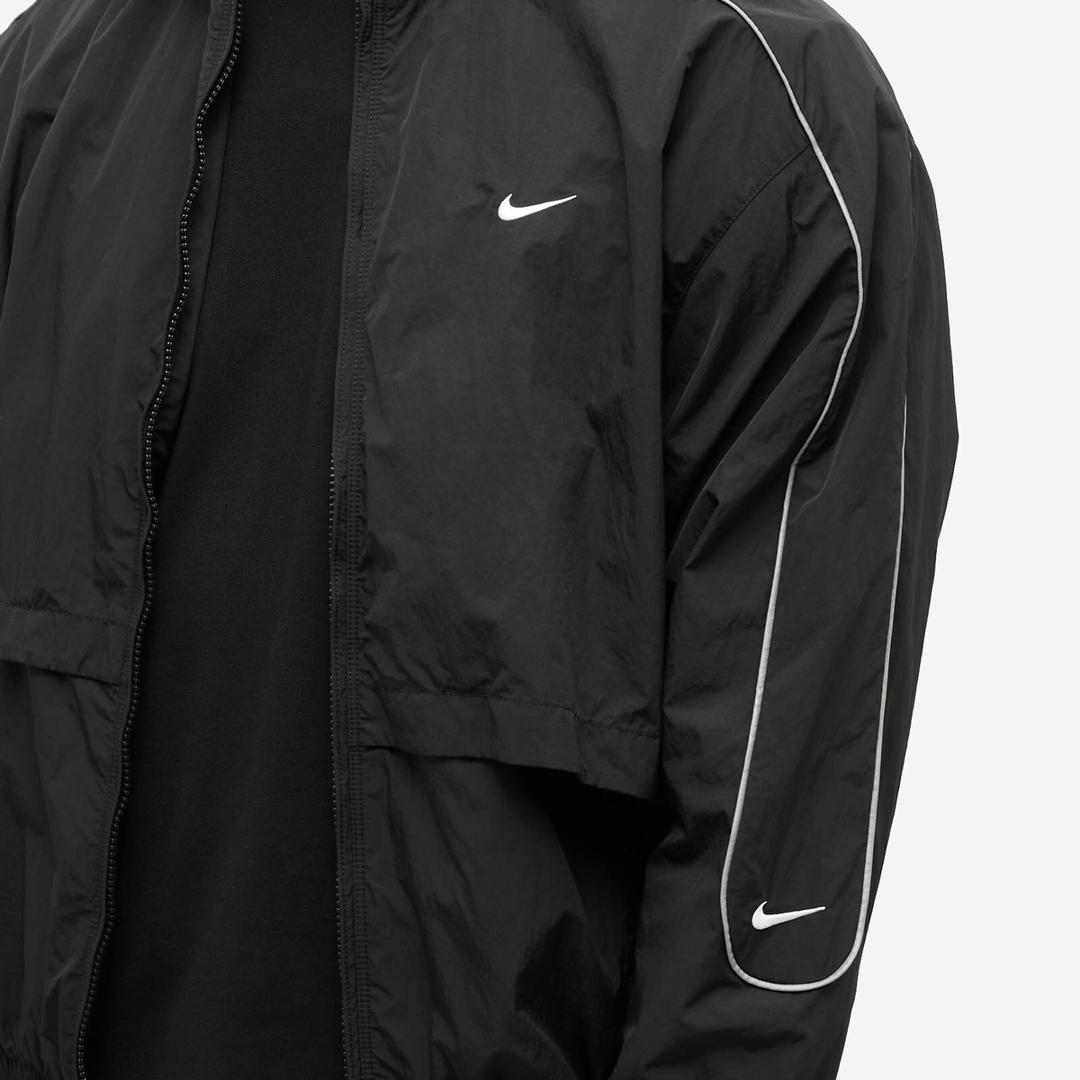 Nike Men's Solo Swoosh Woven Track Jacket in Black/White Nike