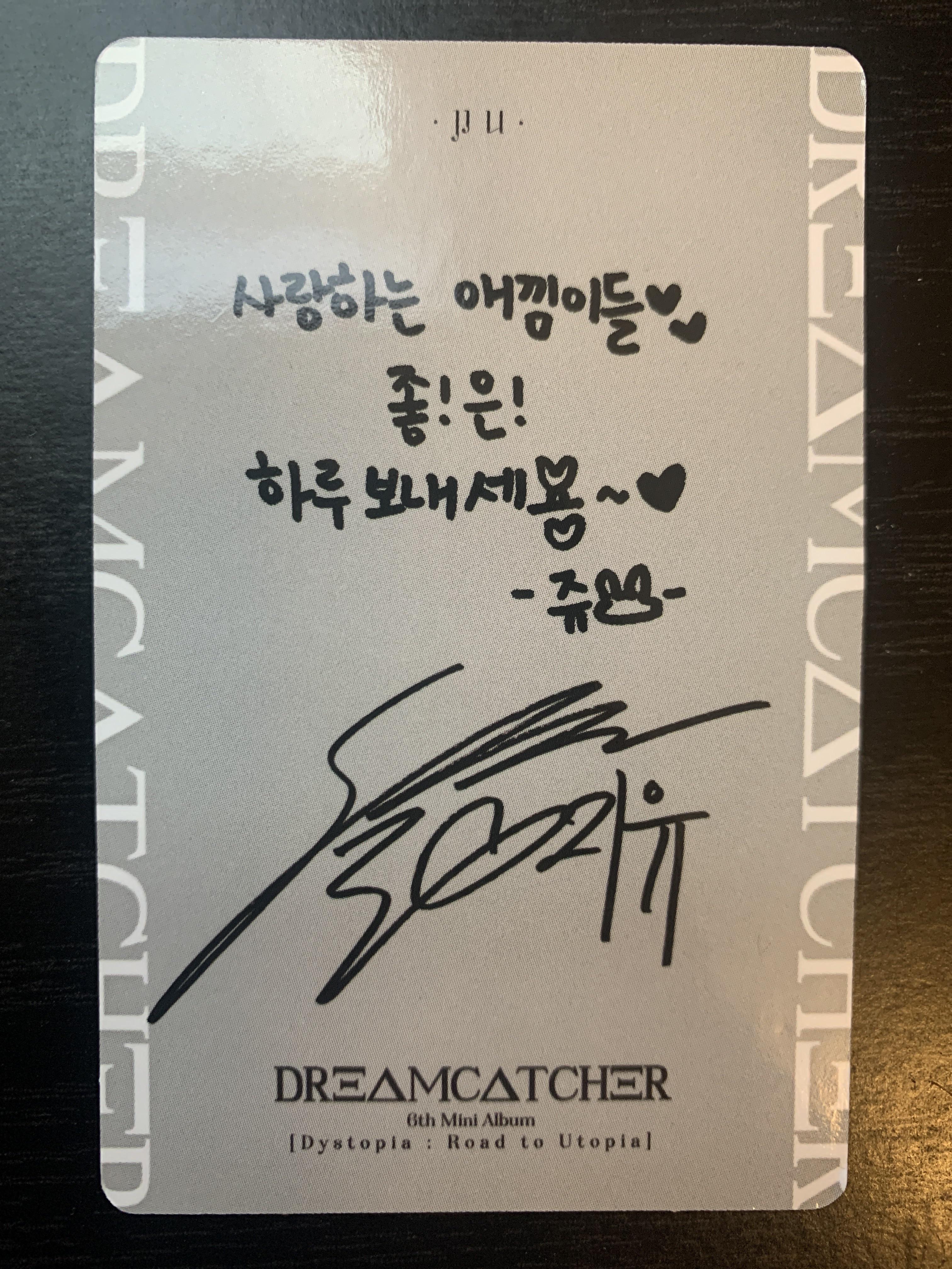 What does this say? (JiU's Odd Eye signature card) : r/dreamcatcher