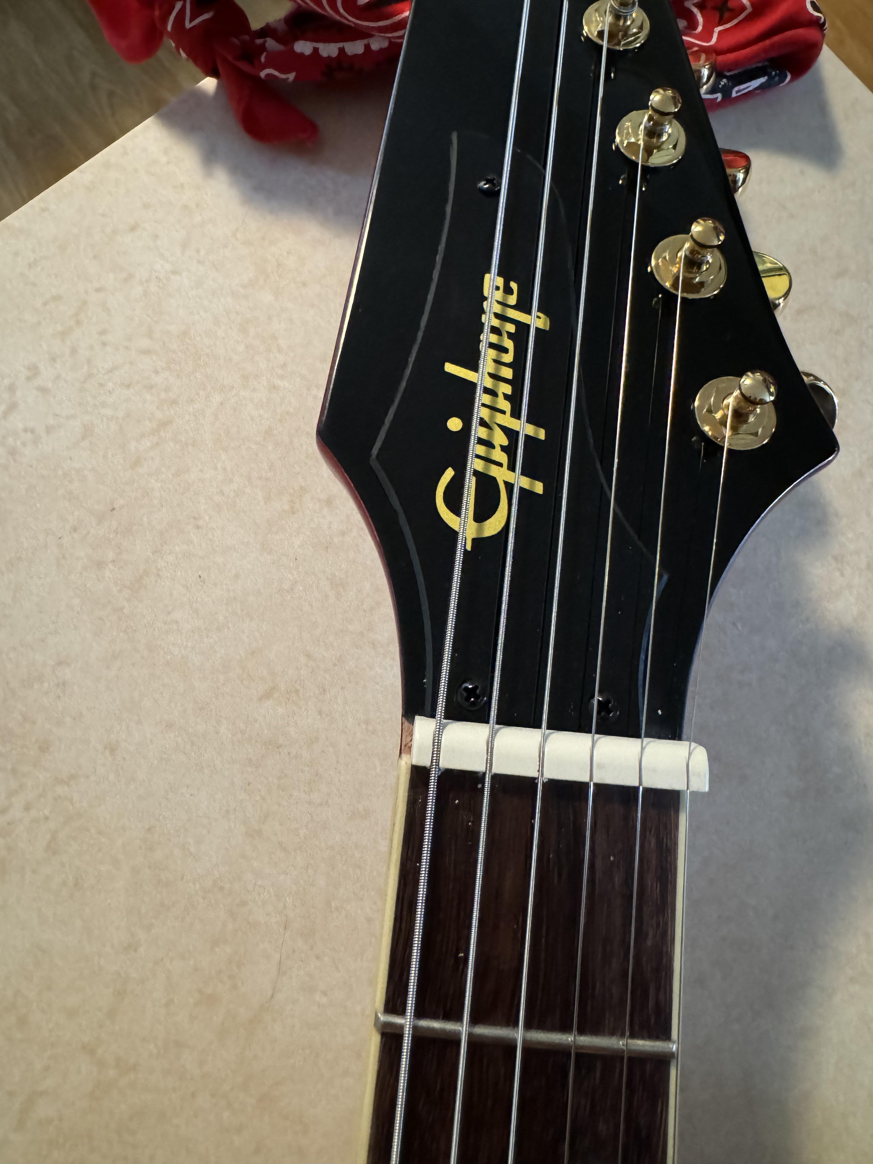 Just being real the newest epiphone firebird is indistinguishable