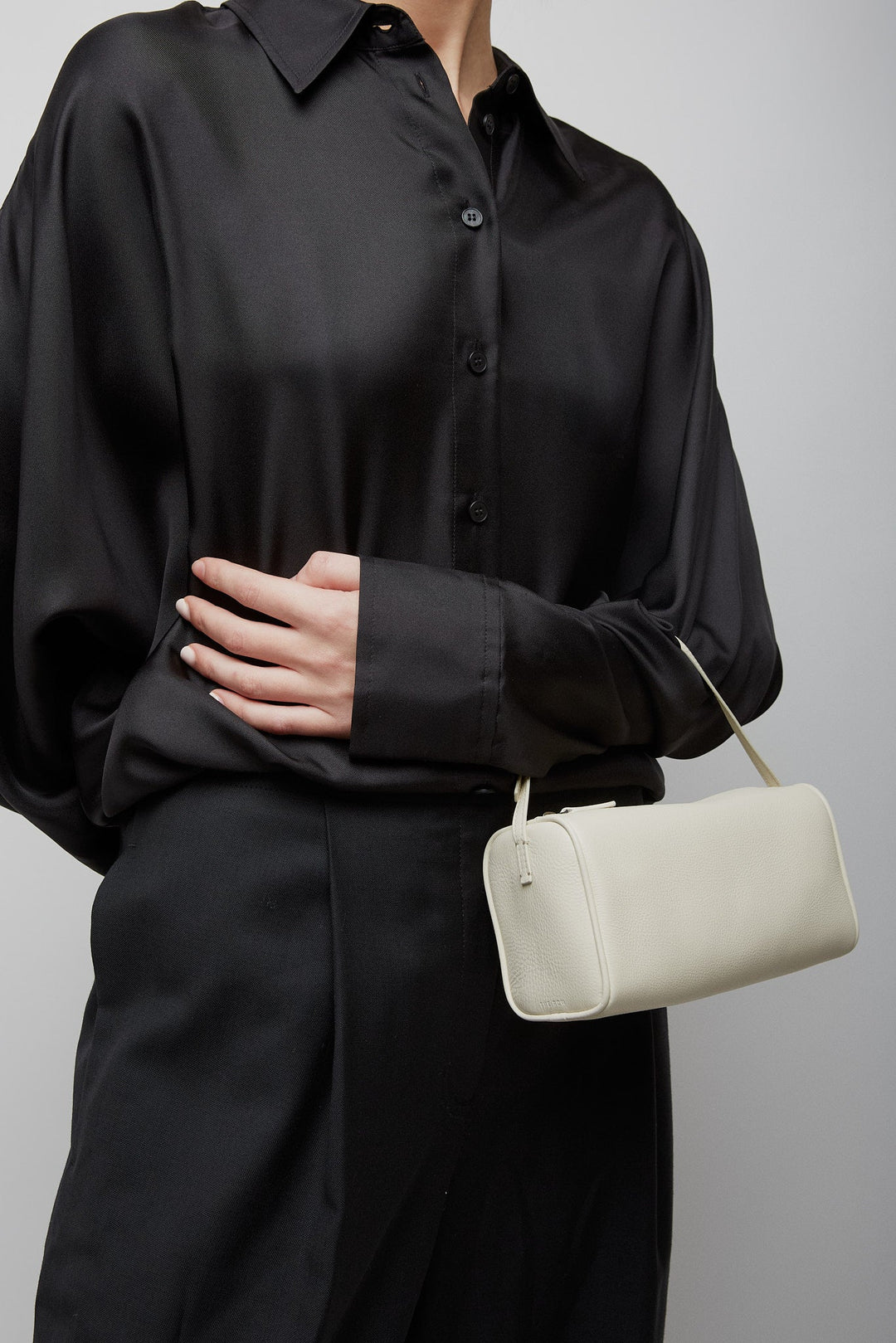 The Row | 90's ivory small grain leather bag | Savannahs